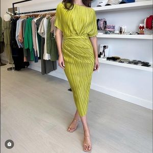 Chic, rushed, 
Chartreuse dress.